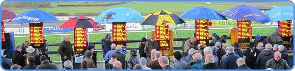 bookmakers in action at horse racing