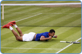 Tennis player show his joy of winning