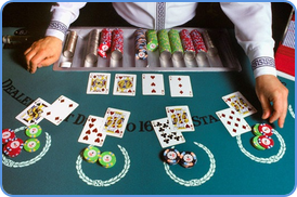 Dealer superintending the poker cash stud game